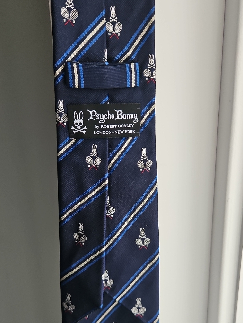 Psycho Bunny Navy Tie with Blue and Cream Diagonal Stripes